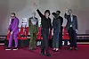 Tom Cruise, center, waves after a press conference to promote his latest movie ″Mission: Impossible - The Final Reckoning,″ in Seoul on May 8. [AP/YONHAP]