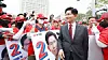 People Power Party presidential candidate Kim Moon-soo greets party supporters in front of the Supreme Court in Seocho District, southern Seoul, on May 15. [YONHAP]