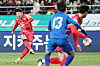 Korea's Son Heung-min, left, shoots during a 2026 World Cup qualifier against Thailand at Seoul World Cup Stadium in western Seoul on Thursday. [NEWS1]