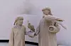 Statues of falconers displayed inside the 'To Our Roots' gallery at the Zayed National Museum [ZAYED NATIONAL MUSEUM]