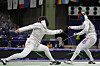 Korean fencer Ha Tae-gyu, right, competes against Carlos Llavador of Spain in the men's foil individual table of 32 at the Paris Olympics at Grand Palais in Paris on Monday. [AP/YONHAP]