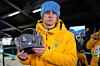 Ukrainian skeleton athlete Vladyslav Heraskevych holds his crash helmet as he stands in the mixed zone of the sliding center at the 2026 Winter Olympics, in Cortina d'Ampezzo, Italy, on Feb. 12. [AP/YONHAP]