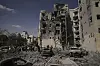 Israeli security forces inspect the site struck by an Iranian missile strike that killed several people, in Beersheba, Israel, on Tuesday, June 24, 2025. [AP/YONHAP]