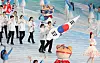 Team Korea enters Harbin International Convention Exhibition and Sports Center in Harbin, China during the Asian Winter Games ceremony on Feb. 7. [YONHAP]