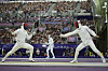 Korea's Kim Jae-won, left, and Japan's Koki Kano compete in the men's individual Epee table of 32 during the Paris Olympics at Grand Palais in Paris on Sunday. [AP/YONHAP]
