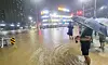 City officials check the flooded roads of Gwangju Buk District on Aug. 3 as heavy rain hits the southern regions of the country. [NEWS1]