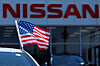 An American flag is shown on a Nissan vehicle at a Nissan dealership in Tustin, California, on July 7. [REUTERS/YONHAP]