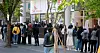 SK Telecom users wait in line to switch their SIM cards in front of a store in Jongno District, central Seoul, on April 29. [NEWS1]