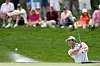 Hideki Matsuyama plays a shot from a bunker on the ninth hole during the third round of The Players Championship at TPC Sawgrass in Ponte Vedra Beach, Florida on Saturday. [GETTY IMAGES]