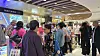 A group of Chinese tourists browse duty-free products at Lotte Duty Free in Jung District, central Seoul on Sept. 29. [NOH YU-RIM]