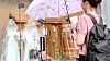 Pedestrians walk by a wedding dress shop on July 11, 2023, in western Seoul. [NEWS1]