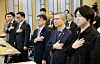 Lawmakers and medical professionals stand during the Pledge of Allegiance at the National Assembly in western Seoul on March 10. [YONHAP]