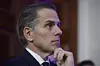 Hunter Biden listens while his father, then-President Joe Biden, speaks during a Hanukkah reception in the East Room of the White House in Washington, Dec. 16, 2024. [AP/YONHAP]