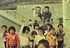 Father Uribe with young children at Sungsimwon, a home for people with Hansen’s disease in Sancheong County, South Gyeongsang, in 1977 when he first visited. [SUNGSIMWON]