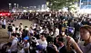 Spectators watch a drone show at Gwangalli Beach in Suyeong District, Busan, on May 31. [YONHAP]