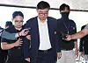 Lithium battery maker Aricell CEO Park Soon-kwan, who is involved in a deadly fire accident, is seen in a photo after ending his questioning session for an arrest warrant in a local court in Gyeonggi last month. [YONHAP]