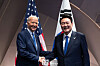 President Yoon Suk Yeol, right, and U.S. President Joe Biden shake hands during a meeting on the sidelines of the North Atlantic Treaty Organization (NATO) summit on Washington on Thursday. [PRESIDENTIAL OFFICE]
