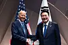 President Yoon Suk Yeol, right, and U.S. President Joe Biden shake hands during a meeting on the sidelines of the NATO summit on Washington on Thursday. [PRESIDENTIAL OFFICE]