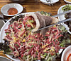 Yukhoe, or raw beef tartare, wrapped in grilled thinly sliced beef brisket [SCREEN CAPTURE]