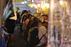 People browse shops in Namdaemun Market in Seoul on June 22. As the government moves forward with its second supplementary budget, which includes distributing household recovery coupons, attention is focused on whether the payments will effectively boost consumption. Studies on Covid-19 relief payouts suggest that new spending generated by such subsidies typically ranged between 20 and 40 percent. [YONHAP]