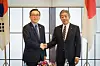 Korean Foreign Minister Cho Tae-yul, left, shakes hands with Japanese Foreign Minister Takeshi Iwaya ahead of their talks in Tokyo on March 22. [YONHAP]