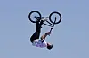 Justin Dowell of the United States performs a trick during the cycling BMX freestyle men's park final in Paris on Wednesday. [AP/YONHAP]
