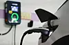 An EV charges at a charging station in central Soul on May 9. [YONHAP]