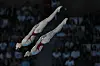 North Korea's Jo Jin-mi and Kim Mi-rae compete in the women's synchronized 10m platform diving final in Paris on Wednesday. [AP/YONHAP]