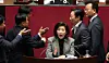 Lawmakers shout at each other as Rep. Na Kyung-won of the People Power Party continues her filibuster against a franchise business bill at the National Assembly in western Seoul on Dec. 9. [YONHAP]