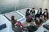 Participants in Seoul's mass blind date event chat during a yacht tour on the Han River in November. [SEOUL METROPOLITAN GOVERNMENT]