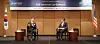 Financial Supervisory Service (FSS) Gov. Lee Bok-hyun, left, and American Chamber of Commerce in Korea Chairman James Kim speak during a dialogue session held in central Seoul on Monday. [FSS]