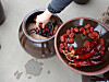 Dried dates and red peppers are placed in a hangari (clay pot) filled with ganjang, or soy sauce, and meju (soybean block). [KOREA HERITAGE SERVICE]