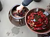Dried dates and red peppers are placed in a hangari (clay pot) filled with ganjang, or soy sauce, and meju (soybean block). [KOREA HERITAGE SERVICE]