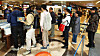 Customers at Kyobo Books' Gwanghwamun branch in Jongno District, central Seoul line up to buy Han Kang's books on Friday, the day after the author's Nobel Prize win. [YONHAP]
