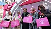 Tourists to Korea and Jang Mi-ran, second vice minister of the Ministry of Culture, Sports and Tourism, middle, attend the 2025 Korea Grand Sale in Jung District, central Seoul, on Jan. 15. [NEWS1]