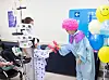 A child patient receives a balloon animal during the ″We Grow Up″ event organized by Seoul National University Hospital’s Pediatric Cancer and Rare Disease Support Project, at the Seoul National University Hospital in Jongno District, central Seoul, on May 2. [JOONGANG PHOTO]