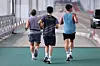 Three men are running at a roadside in Seoul on Aug. 13, 2025. [YONHAP]
