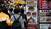 Menus are displayed in front of restaurants in Myeong-dong, Jung District, central Seoul, on May 6. [NEWS1]