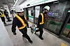 Seoul Metro officials work on recovery efforts in Guro District, western Seoul, on March 23, after a train departing from Sinodrim Station on Seoul's Line 2 derailed. [YONHAP]