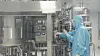 A researcher inspects anthrax vaccine-manufacturing equipment at GC Biopharma's vaccine production facility in Hwasun on July 1. [YONHAP]