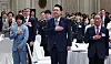 President Yoon Suk Yeol, center, salutes the flag during a luncheon event for 100 descendants of independence fighters, including judoka Huh Mi-mi, an Olympic medalist, left, at the Blue House in central Seoul on Wednesday, on the eve of Liberation Day. [PRESIDENTIAL OFFICE]