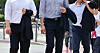 Office workers walk across a street in central Seoul on May 29, 2024. [YONHAP]