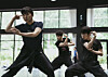 Choreographer Hue Young-soon, left, demonstrates her piece ″Under the Trees’ Voices.″ [SEJONG CENTER FOR THE PERFORMING ARTS]