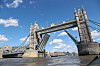 A boat passes under Tower Bridge, as 40 boats take part in a ceremonial pageant along the River Thames to mark the 250th anniversary of the Royal Thames Yacht Club in London, Britain, June 28, 2025. [REUTERS/YONHAP]