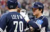 Korea's Moon Hyun-bin, right, celebrates during a K-Baseball Series game against the Czech Republic at Gocheok Sky Dome in western Seoul on Nov. 9. [YONHAP]