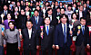 Lawmakers from the liberal Democratic Party and its young members pose for a photo while holding light sticks at the National Assembly in western Seoul on Feb. 23. [NEWS1]