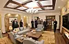 North Korean leader Kim Jong-un, alongside his daughter, inspects the interior of a hotel room in the Kalma coastal tourist area in the country's east coastal city of Wonsan, in this photo published by the Korean Central News Agency on Dec. 31. [YONHAP]