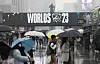 League of Legends fans flock to Gwanghwamun Square for the first day of the Worlds Fan Fest with umbrellas raised on a rainy Thursday in central Seoul. [YONHAP]