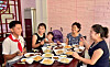 North Korean residents enjoy bowls of jjajangmyeon, or black bean noodles, at a restaurant in Changgwang Food Street, Pyongyang. [CHOSON SINBO]