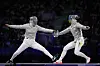 Korea's Choi Se-bin, left, competes with Ukraine's Olga Kharlan in the women's individual sabre bronze medal match during the Paris Olympics at the Grand Palais in Paris on Monday. [AP/YONHAP]